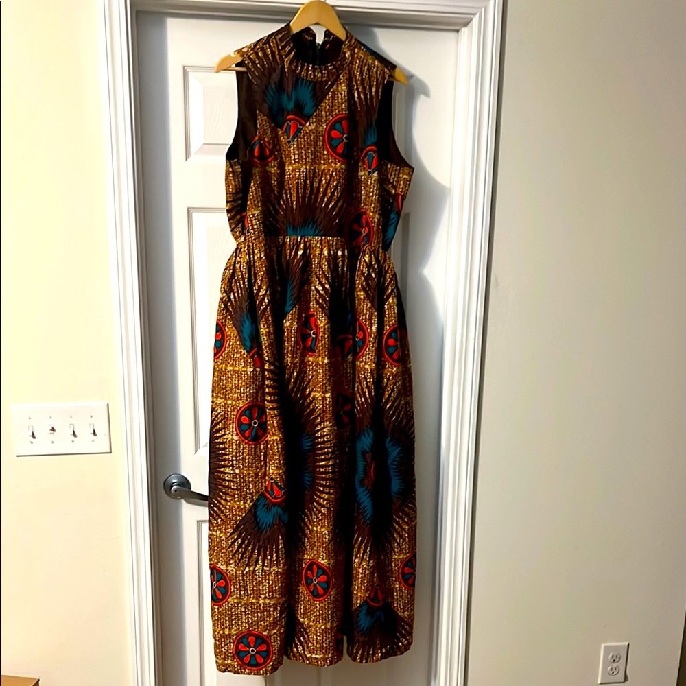 Vibrant Patterned Dress with Orange and Teal Accents
